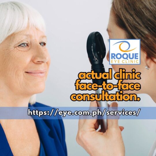 This image shows an eye doctor holding an ophthalmoscope while doing direct funduscopy in a face-to-face consultation in clinic.