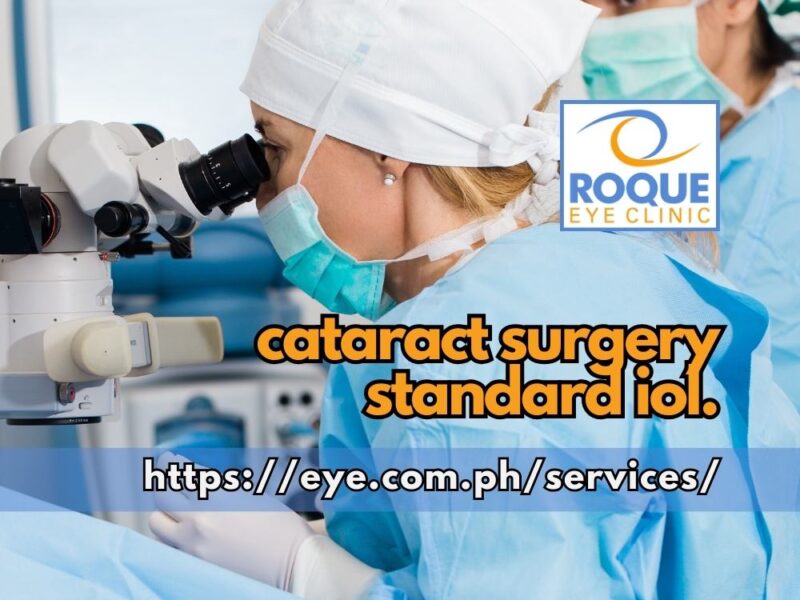This is an image of an ophthalmologist performing cataract surgery in a sterile operating theater using a surgical microscope and a phacoemulsification machine in the background assisted by a scrub nurse.