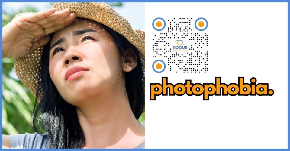 Person squinting to reduce light sensitivity due to photophobia